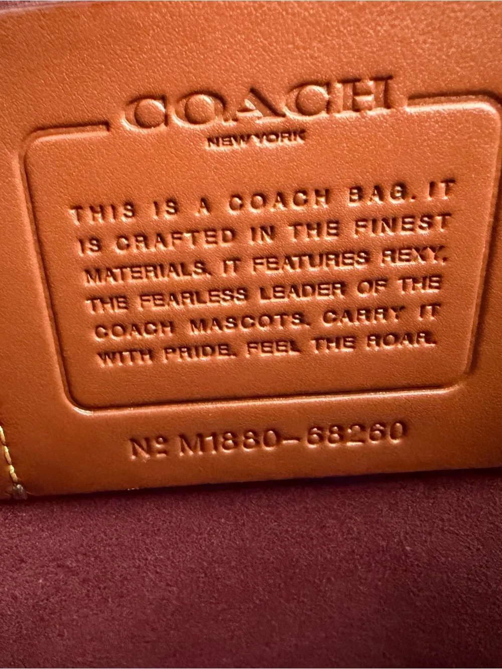 Coach tote front stitching